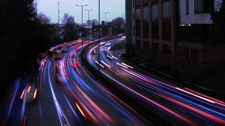 Rush hour traffic fast moving,Fast moving traffic drives time lapse moving fast light road lane effect line light cg